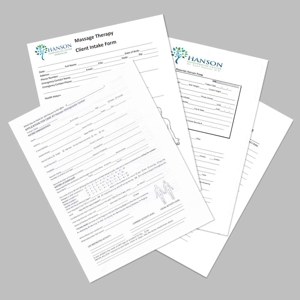 New chiropractic patient paperwork and forms laying flat for easy viewing at Hanson Chiropractic Center in Edmond, OK.